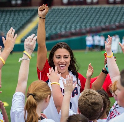 Destinee Martinez, Perfect Game's new national director of softball operations, spreads her love of softball with youth from Oklahoma City during a 2019 USA Softball/MLB Play Ball event to raise awareness for the NCAA's Women's College World Series and to encourage the youth to continue to play the game.