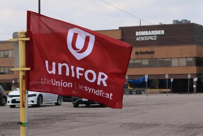 Red Unifor Flag flying outside of the De Havilland plant at Downsview in Toronto. (CNW Group/Unifor)