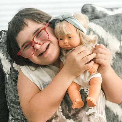 Ruby Plachta with her Miniland Ruby Doll with Down syndrome, sold exclusively at Little Wonder & Co. with proceeds benefiting non-profit organization Ruby's Rainbow.