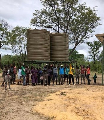 The first of a planned 22 potable, solar-powered water wells to be drilled and donated by ReconAfrica to communities in the Kavango East and Kavango West regions of Namibia in 2021/2022. To date, ReconAfrica has completed and donated 14 water wells. (Photo: Courtesy of ReconAfrica) (CNW Group/Reconnaissance Energy Africa Ltd.)