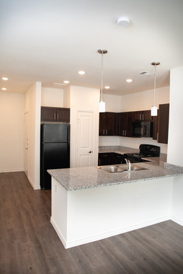 The kitchen of a unit reflects the high-quality design of the AMTEX Green Oaks Apartments, a new 177-unit affordable housing community in northeast Houston.