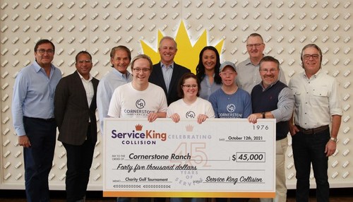 Service King celebrates 45th anniversary by presenting check to special needs community