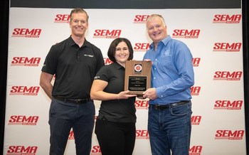 Cooper Tire’s Executive Director of Product Marketing, Michiel Kramer, and Product Manager, Jenny Paige, pose with Bill Maher, senior vice president, Specialty Equipment Market Association, in celebration of Cooper Tire’s Discoverer Snow Claw being named “Best New Tire” Runner Up at the 2021 SEMA Show Nov. 1, 2021. (Jessica Yanesh for Goodyear)
