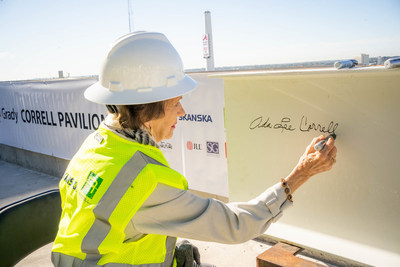 Ada Lee Correll signs the ceremonial beam at the Correll Pavilion topping out event.
