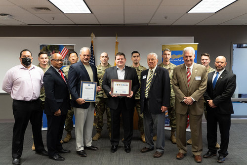 Leaders from Employers Support of The Guard and Reserve (ESGR) New Jersey committee including Mike Ferraro (ESGR-NJ State Chair) presented the prestigious Seven Seals Award to Mike Patterson, Chief Operating Officer of Freedom Mortgage, and fellow employees and reservists.