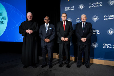 During the meeting’s closing session on Nov. 7, Supreme Knight Kelly honored four Knights with the St. Michael Award for exemplary service to the Order. Receiving the St. Michael Award were (left to right) Augustinian Father John Grace, former director of chaplains for the Knights of Columbus; Former Supreme Warden George W. Hanna; Supreme Master Dennis Stoddard; and Col. Charles “Chuck” Gallina (USMC-Ret.), the supreme knight’s advisor for military and veterans affairs.