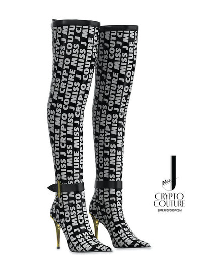Crypto Couture Signature Print Thigh High Boots with Gold Spike Heel are sure to give you the confidence to rule the runways of everyday life while meeting new people and old friends in the Metaverse. The classic design is timeless and is one item that we think is going to sell out quickly and make a very good and profitable re-sale item. While we can never guarantee resale values we admit everyone we have spoken with thinks these are a good investment and has wanted a pair, including myself! It