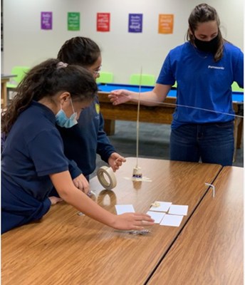 On November 8, 2021, National STEM/STEAM Day, eight female engineers from Panasonic volunteered at the Boys & Girls Club of Truckee Meadows to lead a group of girls in a hands-on STEM education workshop focused on engineering design.