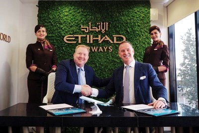 Stan Deal, Boeing Commercial Airplanes President and CEO, and Tony Douglas, group chief executive of Etihad Aviation Group, after signing an agreement expanding the companies’ partnership towards sustainable aviation for the Abu Dhabi-based airline and wider industry. (Boeing Photo)