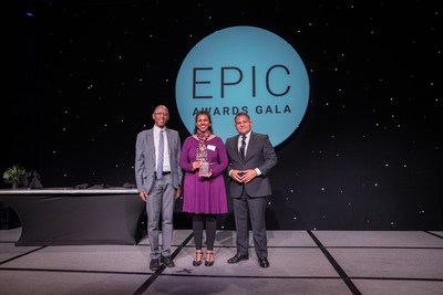 OST's DEI committee co-chair Kiran Sood Patel (center) accepts the DEI Champion of the Year award of behalf of OST at the Grand Rapids Chamber of Commerce EPIC awards on Monday, October 25, 2021.