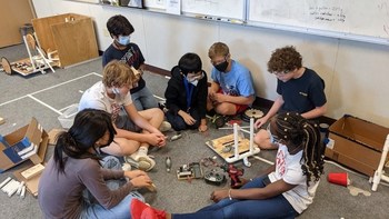 Middle School Students Working Together to Design and Construct Their Competition Robot