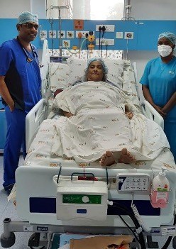 Dr. Ashok Kumar with the patient after the operation