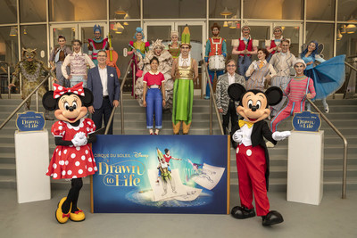 Front row from left to right: Minnie Mouse, Walt Disney World Resort President Jeff Vahle, the characters Julie and Mr. Pencil, Cirque du Soleil President and CEO Daniel Lamarre, and Mickey Mouse join artists from Drawn to Life, the highly anticipated new collaboration from Cirque du Soleil and Disney. The show premiered on Nov. 18, 2021 at Walt Disney World Resort in Lake Buena Vista, Fla. (Kent Phillips, photographer).