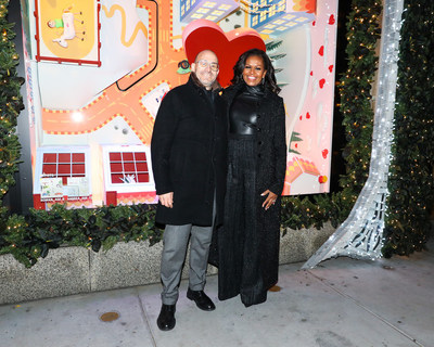 L to R: Marc Metrick, CEO of Saks, and Michelle Obama,  Former First Lady of the United States and founder of the Girls Opportunity Alliance, at the Saks Fifth Avenue Holiday Window Unveiling