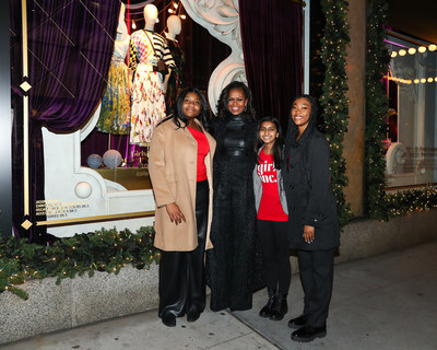 L to R: Caitlin White from the Girls Opportunity Alliance community from Girls Inc., Michelle Obama, Former First Lady of the United States and founder of the Girls Opportunity Alliance and Dreshta Bohria and Jada Yelverton-Graves from the Girls Opportunity Alliance community from Girls Inc. at the Saks Fifth Avenue Holiday Window Unveiling