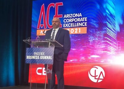 Trox CFO Dan Gerelick accepts the Phoenix Business Journal's ACE Award for Fastest-Growing Company.