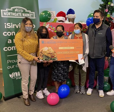 Northgate Market and Oportun donate hundreds of turkey vouchers and surprised two families with cash gift cards to help them pay for bills and other expenses during the holidays.