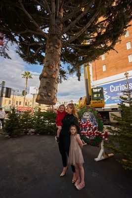 Award-winning actor Erika Christensen and her daughters welcome the arrival of the 60-foot white fir Christmas tree as it is craned into position at L Ron Hubbards Winter Wonderland on Hollywood Blvd.