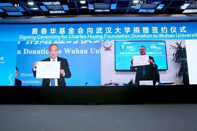 Charles Huang Foundation Makes Record-Breaking US$40 Million Donation to Alma Mater, Wuhan University. President of Wuhan University, Prof. Dou Xiankang (left) and Dr. Charles Huang (right) showing certification of donation at the online ceremony.