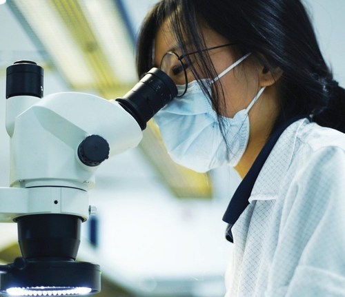 During the pandemic, approximately 80 employees at Olympus Canada were considered essential workers, including this staff member repairing an endoscope.