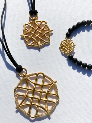 NYINI LUXURY Partners with Mina Stones: Launches the Arewa Medallion Collection, Benefiting Pact's Efforts in West Africa