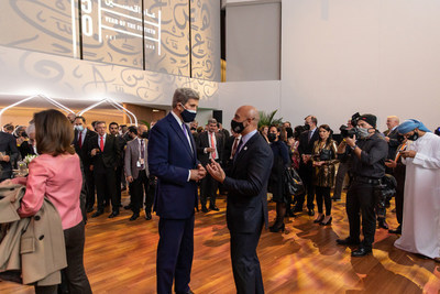US Special Presidential Envoy for Climate John Kerry speaks with Ambassador Yousef Al Otaiba.