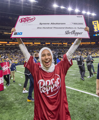 Synene Maria A., winner of the Dr Pepper Tuition Toss during halftime at the 2021 Big Ten Conference Championship Game on December 4, 2021, at Lucas Oil Stadium  Indianapolis, Indiana. CREDIT: AP IMAGES FOR DR PEPPER