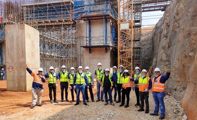 MEMBERS OF THE NOMAD AND ORION TEAMS WITH MEMBERS OF PLATREEF’S MINE DEVELOPMENT TEAM AT THE FOUNDATION FOR THE SHAFT 2 HEADFRAME THAT IS UNDER CONSTRUCTION (CNW Group/Nomad Royalty Company Ltd.)