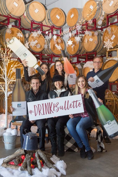 Attendees enjoy the photo booth at Balletto Vineyards