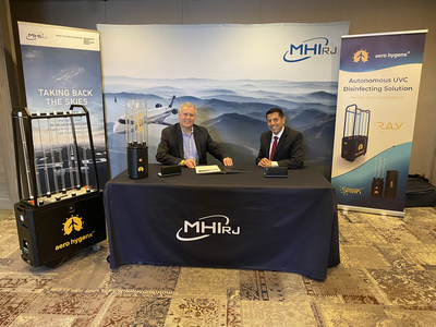 MHI RJ Head of Aftermarket Customer & Product Support Mr. Robert Duffield and Aero HygenX CEO Mr. Arash Mahin signing the Cooperation Agreement in Saint-Sauveur, Québec