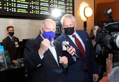 Maryland Governor Larry Hogan joins Horseshoe Casino Baltimore Senior Vice President and General Manager Randy Conroy after placing the ceremonial first bet at Caesars Sportsbook at Horseshoe Casino Baltimore on Friday, Dec. 10, 2021