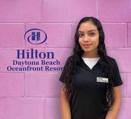 Lenir Aguilar, guest room attendant (GRA) at the Hilton Daytona Beach, and recipient of UMF Corporation's GRA Excellence Award