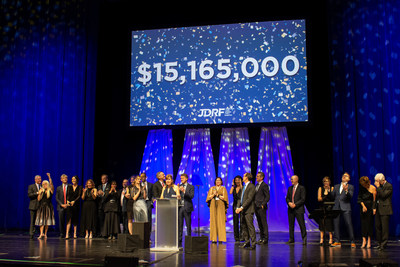 JDRF Illinois One Dream Gala leadership celebrates on-stage after announcing a record-breaking year of fundraising for type 1 diabetes (T1D) research.