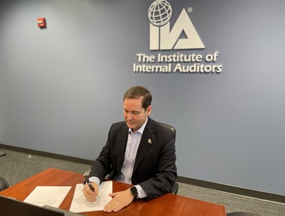 Anthony Pugliese, CIA, CPA, CGMA, CITP, President and CEO of the Institute of Internal Auditors signs the Memorandum of Understanding