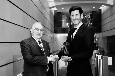 Patrick Snow, Executive Chairman and founder of ICEBERG IP Group, being presented with a 2021 Queens Award for Enterprise by Kevin Traverse-Healy DL, Deputy Lieutenant of Greater London