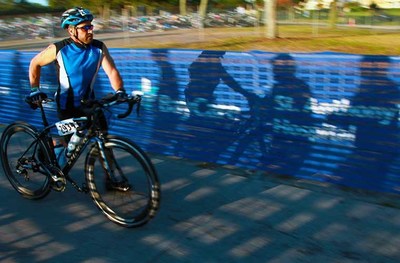 A participant runs out of bike transition at the St. Anthony’s Triathlon. Registration for the race weekend, which is scheduled April 29- May 1, opens on Wednesday Decemeber 15.