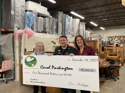 Elkay's 2021 Sternberg Philanthropy Award winner Carol Partington accepts $5,000 donation to Sharing Connections Furniture Bank alongside Sharing Connections Founder Leeanne McGrath and Chief Executive Officer Ryan Varju.