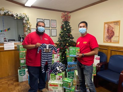 Pull-A-Part employees deliver gifts to a local charity as part of its annual Adopt-A-Family Program. The company raised more than $33K to help 41 families in 12 states this holiday season.