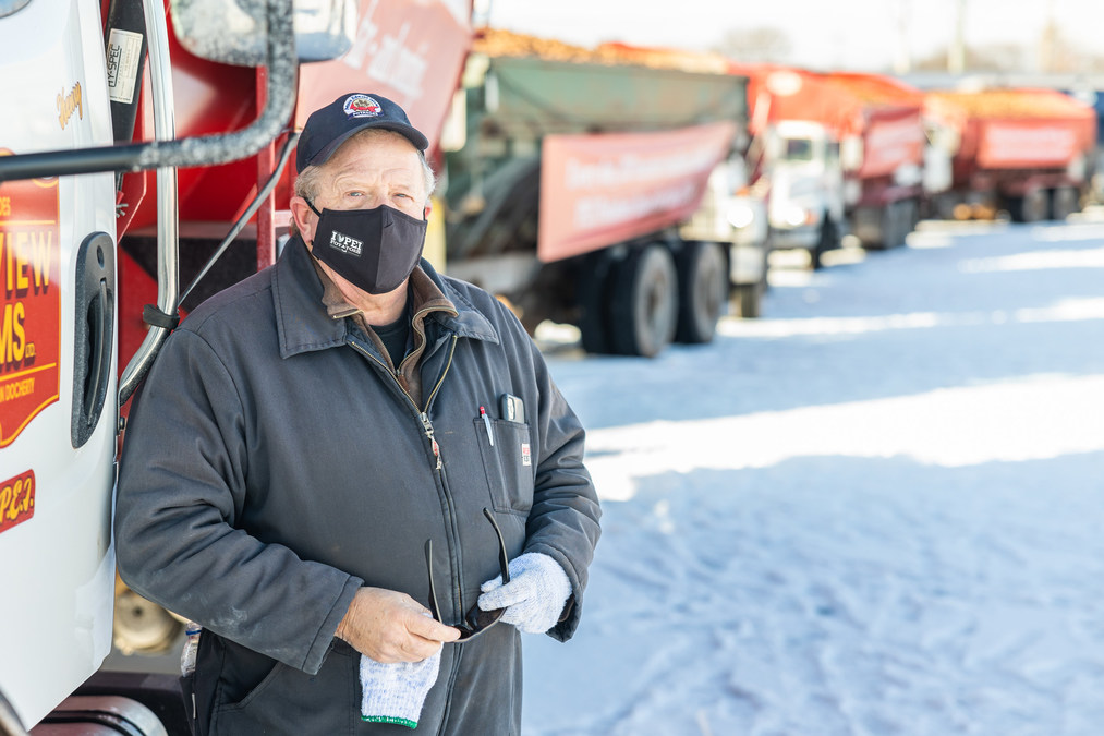 Convoy of trucks carrying half a million pounds of fresh potatoes parade on the streets of Charlottetown with messages of solidarity in support of PEI potato farmers - Vimarsana News