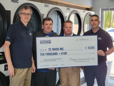 Pictured from left to right: TJ McEwen, CSC Service Works, Charles Hinkel, TC Wash Inc. (Contest Winner), Michael Mentzer, Whirlpool Corporation, Mike Meir, CSC Service Works.
