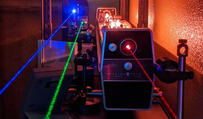 Twinkling beams from an early '70s red gas laser, an early '90s green solid-state laser, and a modern blue diode laser. These lasers are on on display in the Vintage Lasers & Holograms exhibit in Tempe, Arizona until the end of April.