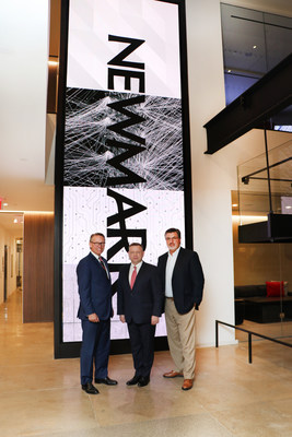 Newmark's Chief Revenue Officer Lou Alvarado (R), Chief Executive Officer of Global Corporate Services Rick Bertasi (L), pictured with Piotr Kaszyński, Managing Partner of Newmark Polska, at Newmark's New York, NY HQ