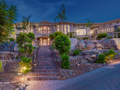 Perched on a gentle hillside, this Arizona residence offers striking views over Paradise Valley to the surrounding Phoenix Mountains. Once asking $6 million, the property will now be sold without reserve at a luxury auction scheduled for Jan 15, 2022. Learn more at ParadiseLuxuryAuction.com.