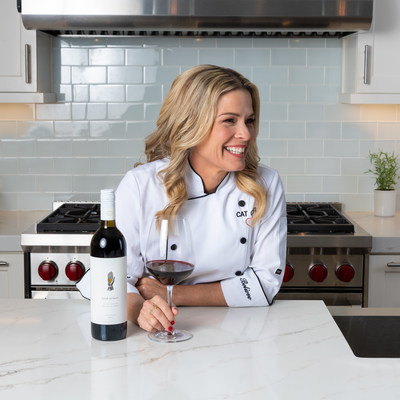 Cat Cora with Hand on Heart non-alcoholic wines