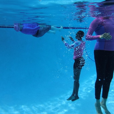 Swimming students have learned to swim when they can rest in deep water.