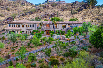 This luxe, two-story home is located in Tatum Canyon, an upscale residential enclave in the city of Paradise Valley, AZ. The city is consistently rated by Bloomberg as one of the wealthiest in the United States. The property entered the market earlier this year asking $6 million, but will now be sold without reserve to the highest bidder at a live, luxury auction® on Jan 15. More at ParadiseLuxuryAuction.com.