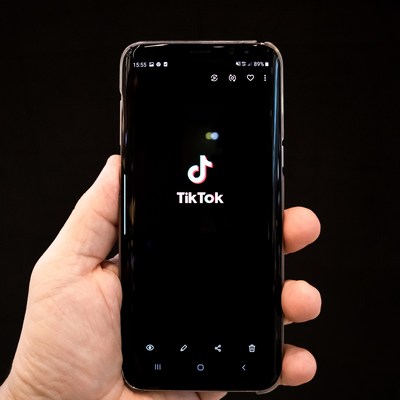 TikTok user uploading video.
