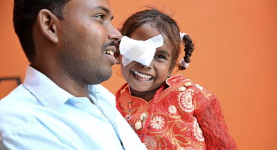 San traveled over 90 miles by bus so that his daughter, Vaishnavi, could receive cataract surgery at an Orbis partner hospital in India. 