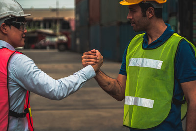 Two cargo workers starting their shifts