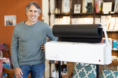 Peter Sterios, founder of Manduka Yoga Mats & team member at Lightworker UV, with the LightworkerUV yoga mat cleaning machine at Yoga Soup studio in Santa Barbara, California.
